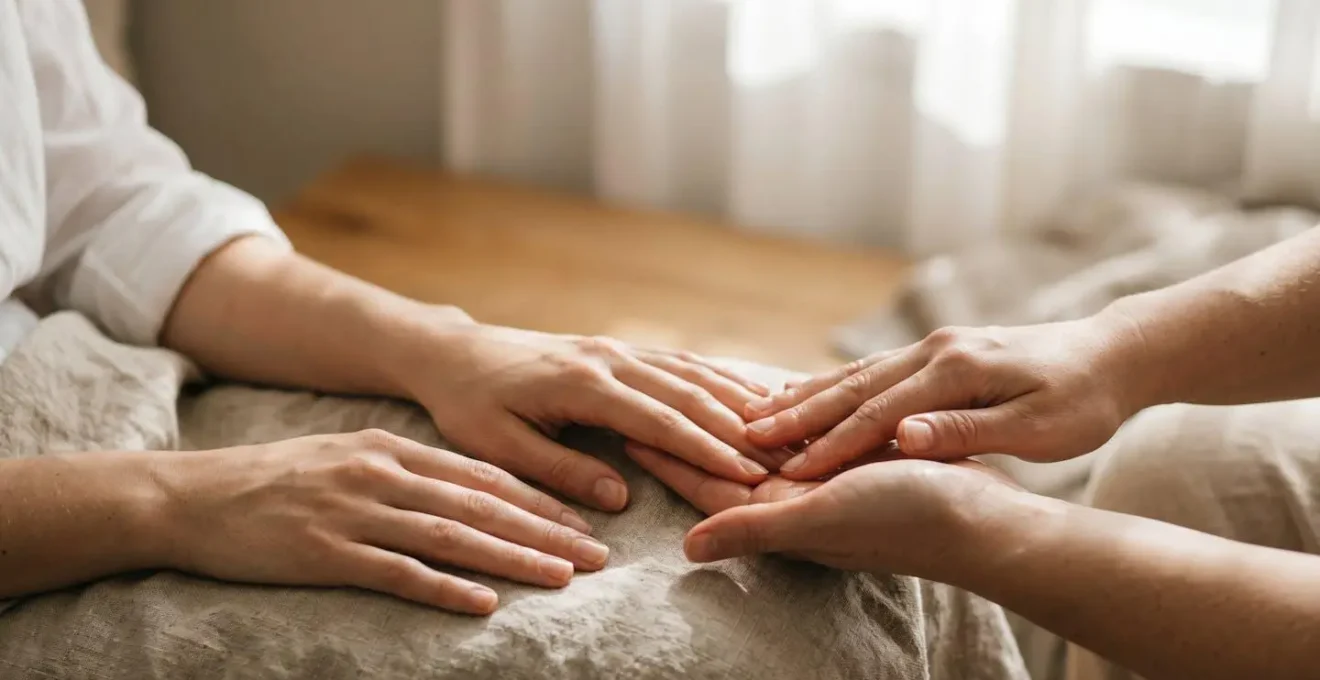 Serene hands receiving gentle care treatment in tranquil spa environment